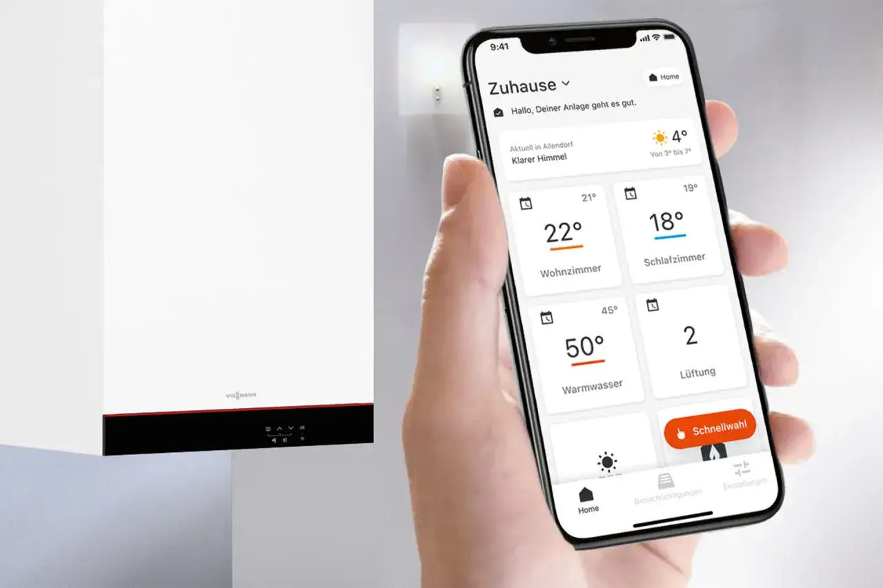 Smartfon z aplikacją Viessmann pokazuje, jak oszczędnie ustawić piec gazowy Viessmann, kontrolując temperaturę w domu i ciepłą wodę.