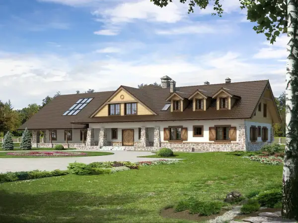 Projekt pensjonatu 10 pokoi: przestronny dom z kamienną podmurówką, brązowym dachem i werandą. Otoczony zielenią, z podjazdem i kwitnącymi rabatami.